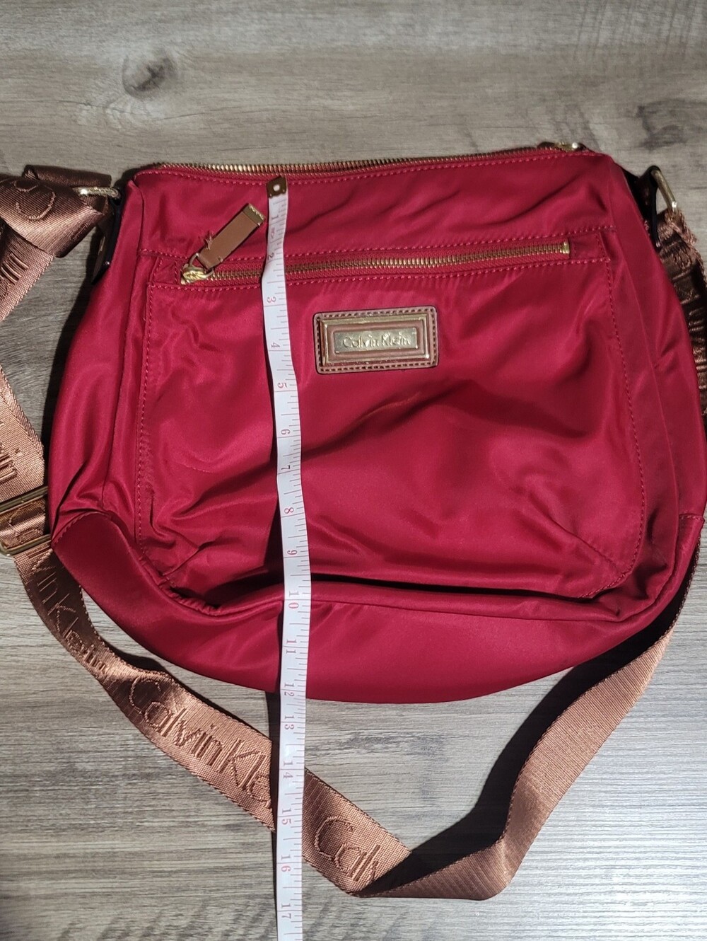 Calvin Klein Crimson Crossbody Bag with Branded Strap